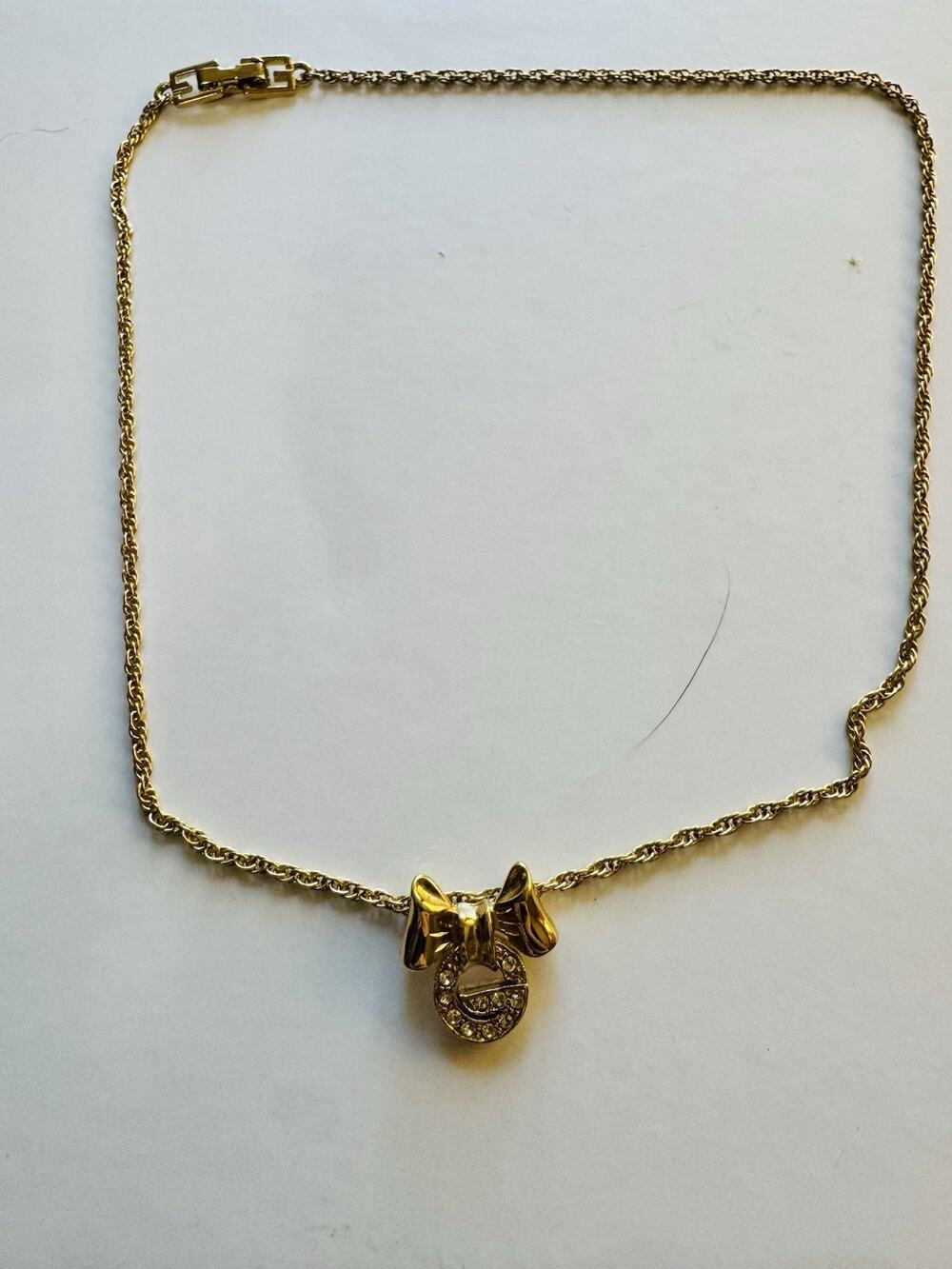 Vintage Givenchy Gold-Tone Bow Pendant Necklace with Rhinestones